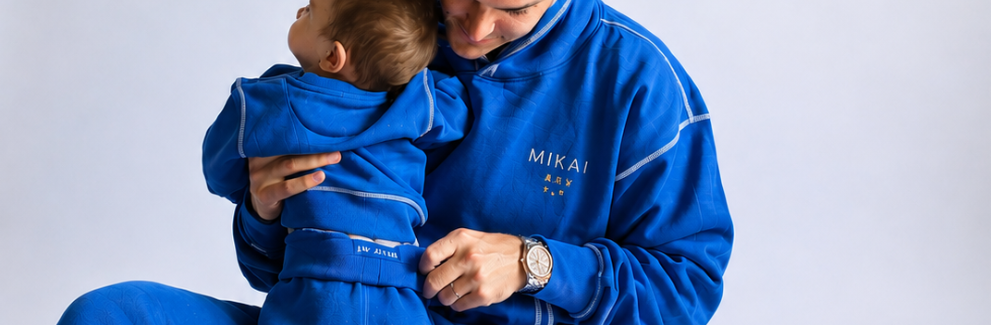 Dad and baby in matching No Blues sets
